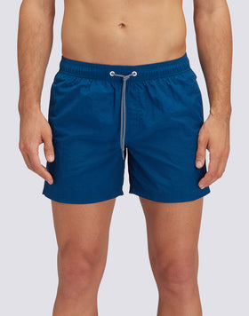 SHORT CRINKLED SWIM SHORTS WITH AN ELASTICATED WAISTBAND