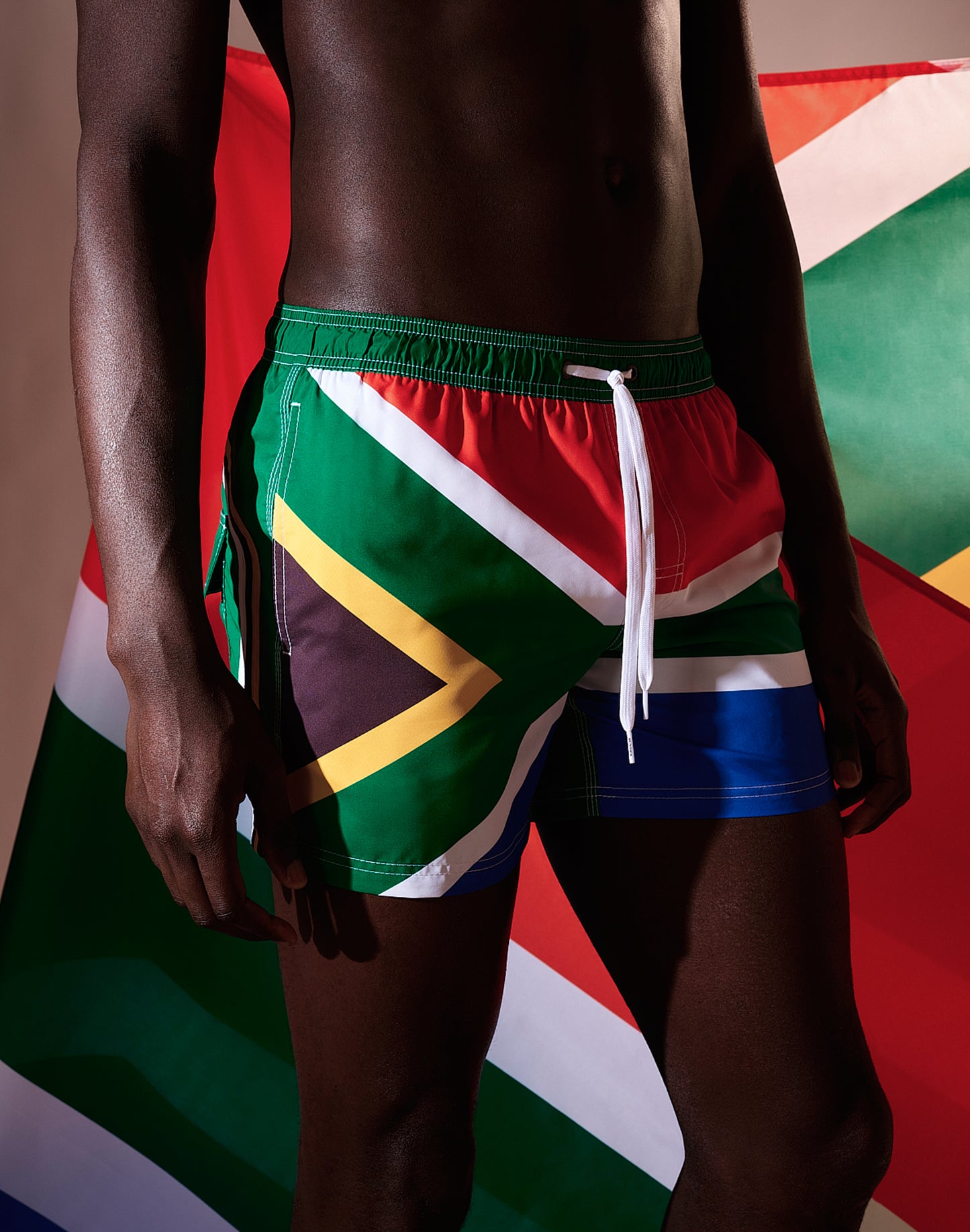 SHORT SWIM SHORTS WITH AN ELASTICATED WAISTBAND RECYCLED POLYESTER REPREVE® SOUTH AFRICA FLAG