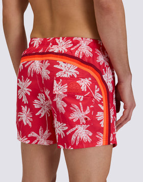 SHORT SWIM SHORTS WITH ELASTIC WAISTBAND IN REPREVE® RECYCLED POLYESTER WITH PALM OASIS PRINT