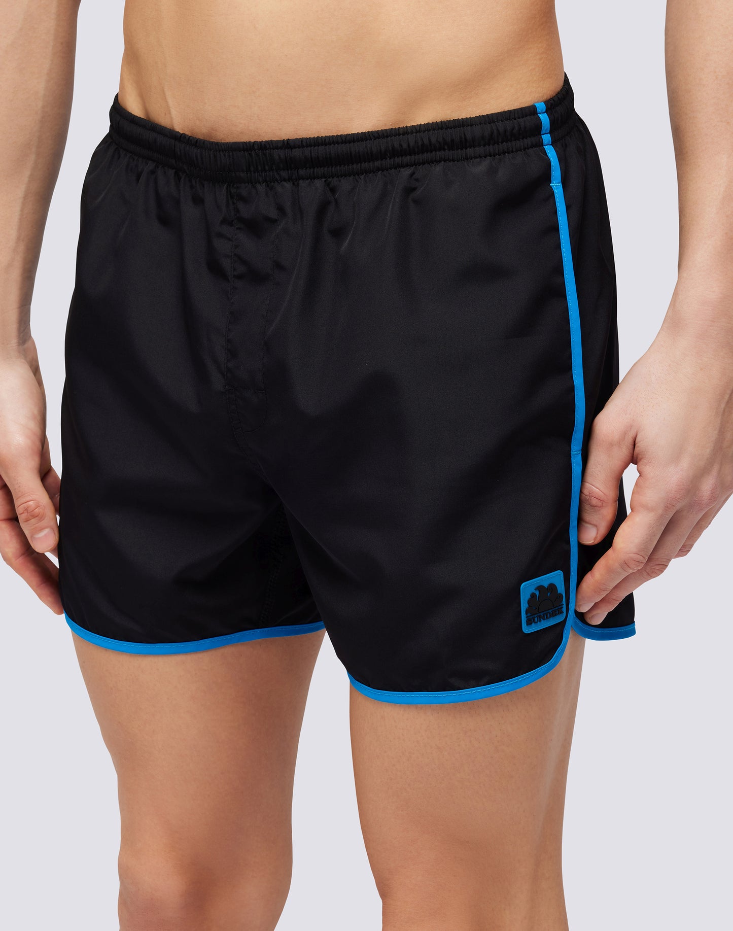 SHORT SWIMSHORTS WITH ELASTIC WAIST AND ROUND SIDE SLITS