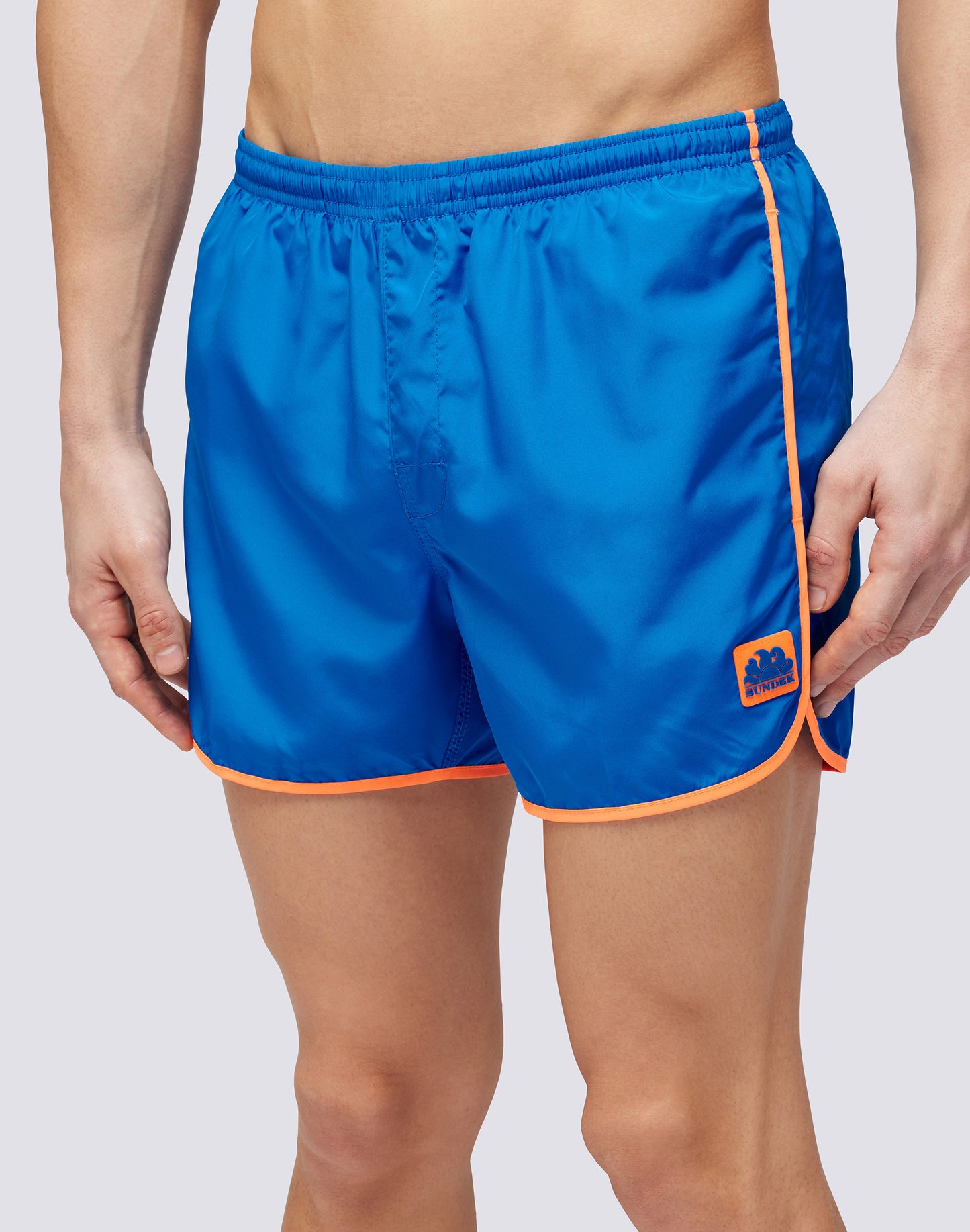 SHORT SWIMSHORTS WITH ELASTIC WAIST AND ROUND SIDE SLITS