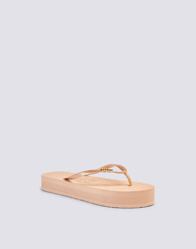 FLIP-FLOPS WITH GLITTER AND HIGH SOLE