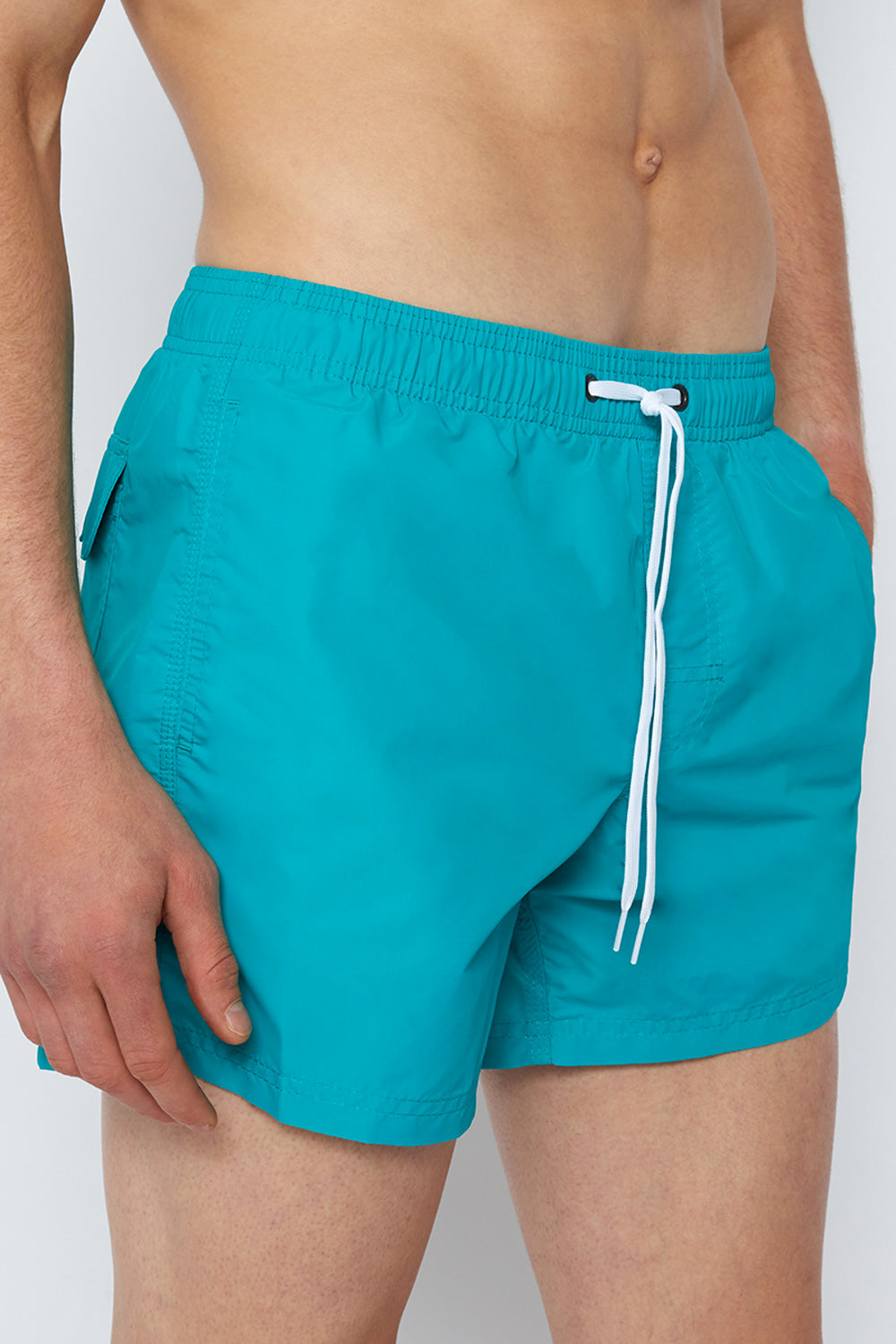 SHORT SWIM SHORTS WITH AN ELASTICATED WAISTBAND